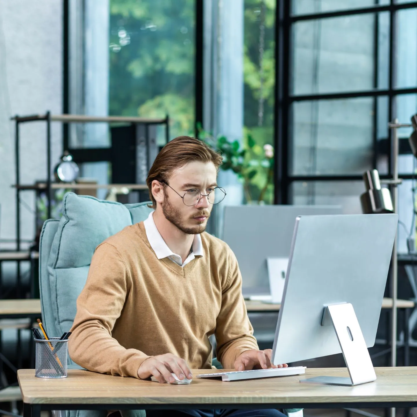 Thinking man at desk